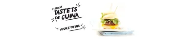 Rètol de la 2a edició del Tastets de Cuina amb una minihamburguesa emplatada.